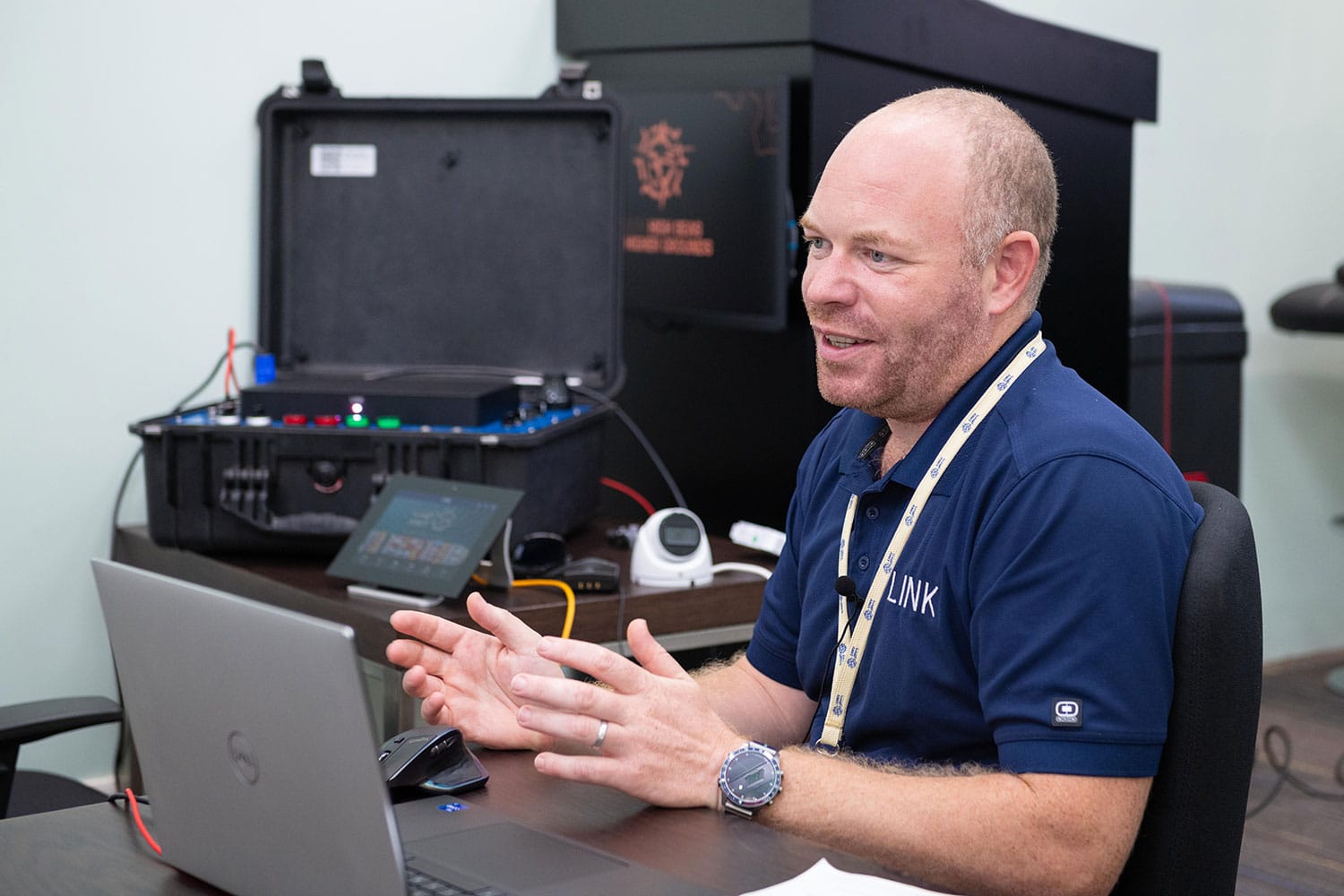 Will Hopkins, LINK CEO delivery Link training at a computer